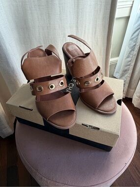 le chateau Brown Grommet Strap Block Heels